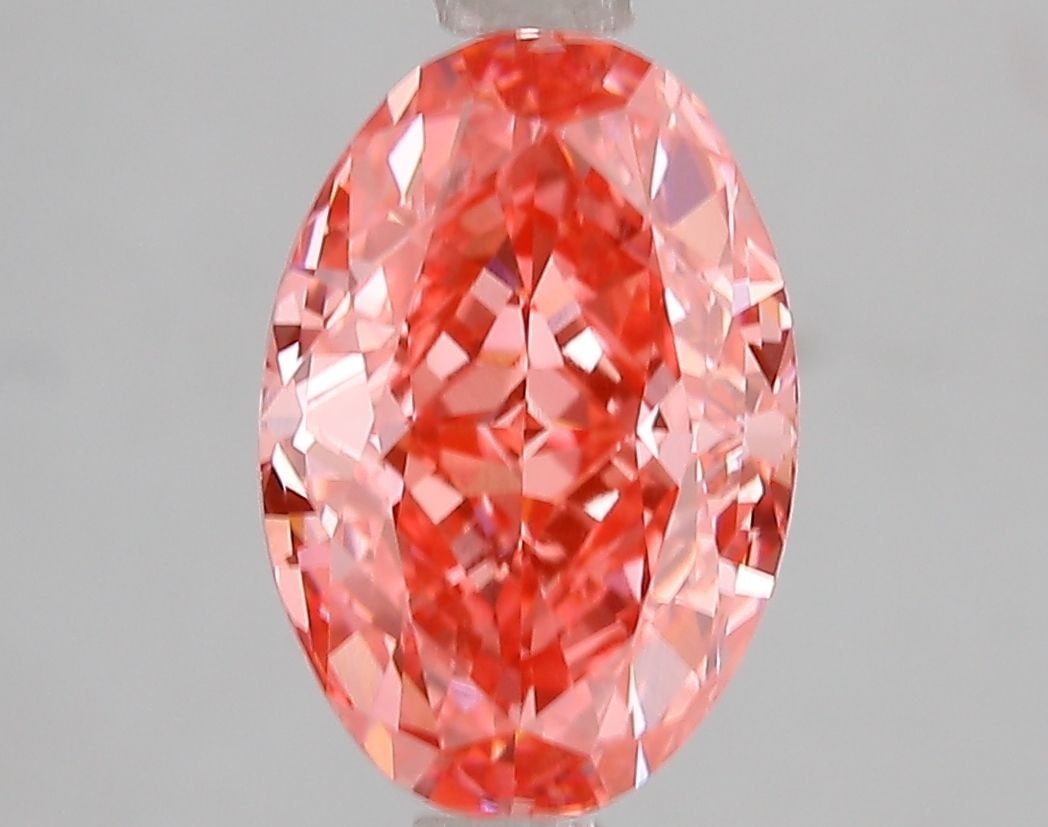 Loose Diamond - OVAL 3.06ct Fancy Vivid Pink VS1: Loose Diamond - OVAL 3.06ct Fancy Vivid Pink VS1 Source: This is a real non-mined Diamond that has been grown in a lab Shape: OVAL Carats: 3.06 Color: Fancy Vivid Pink Certification: IGI Video: