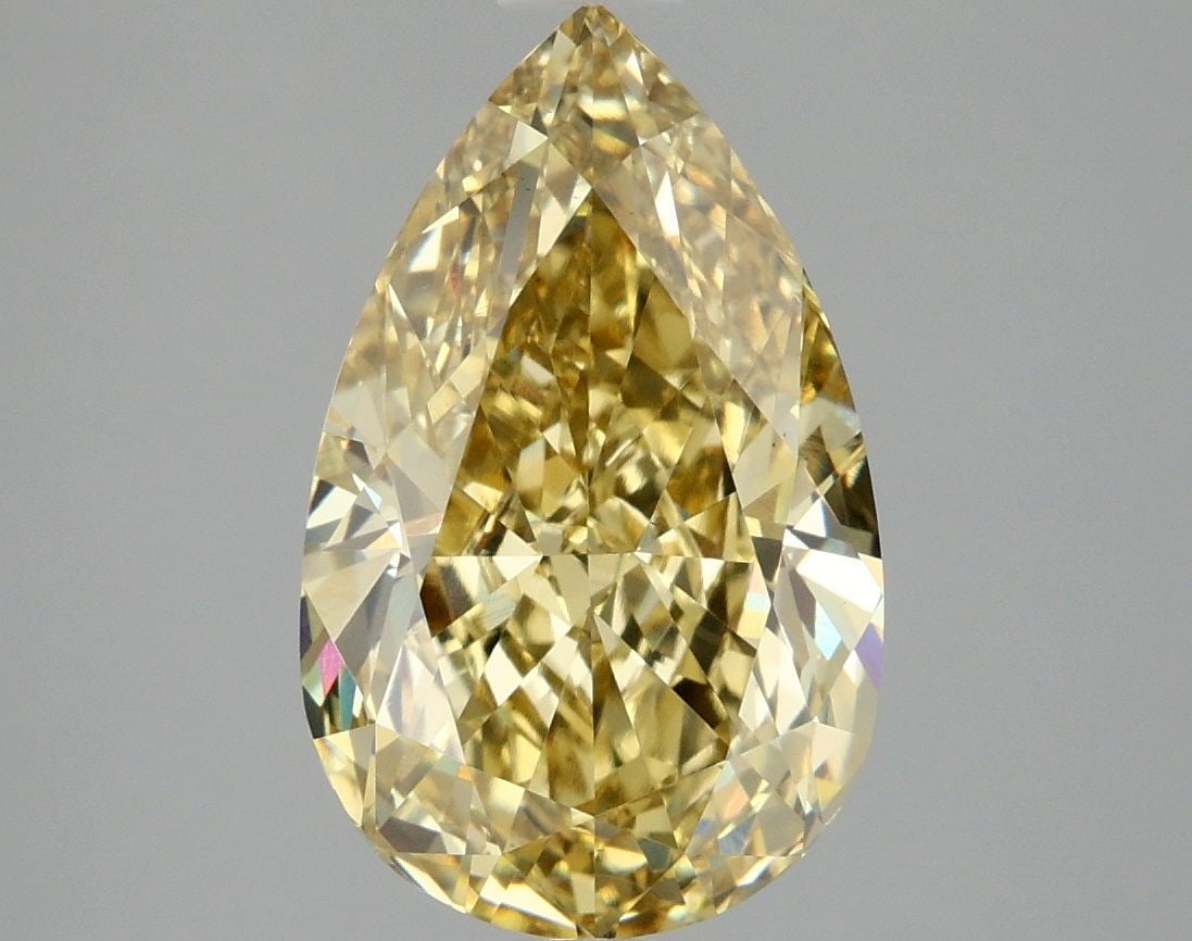 Loose Diamond - PEAR 4.1ct Fancy Vivid Yellow VS1: Loose Diamond - PEAR 4.1ct Fancy Vivid Yellow VS1 Source: This is a real non-mined Diamond that has been grown in a lab Shape: PEAR Carats: 4.1 Color: Fancy Vivid Yellow Certification: IGI Video: