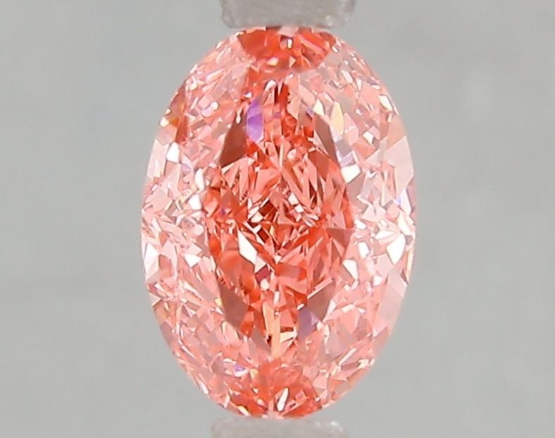 Loose Diamond - OVAL 1.01ct Fancy Vivid Pink VS2: Loose Diamond - OVAL 1.01ct Fancy Vivid Pink VS2 Source: This is a real non-mined Diamond that has been grown in a lab Shape: OVAL Carats: 1.01 Color: Fancy Vivid Pink Certification: IGI Video: