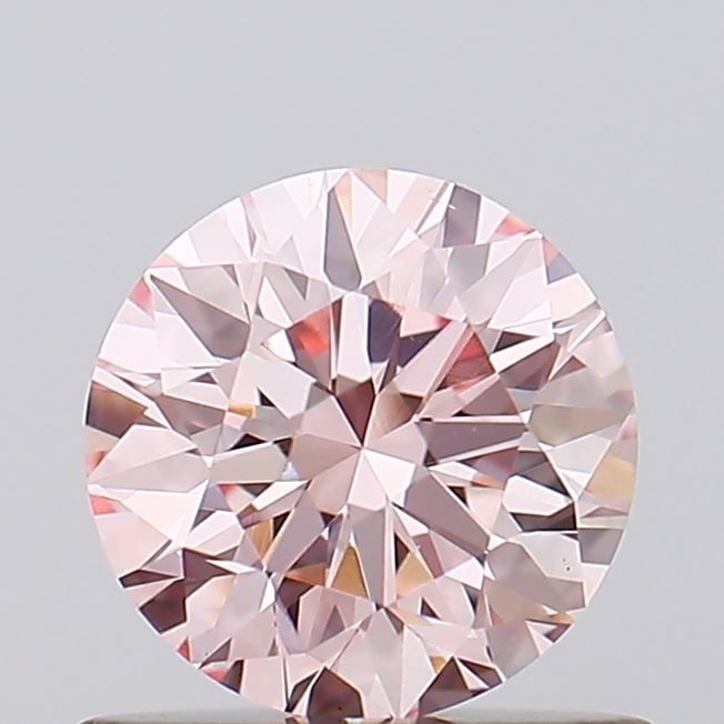 Loose Diamond - ROUND 0.66ct Fancy Intense Pink VS2: Loose Diamond - ROUND 0.66ct Fancy Intense Pink VS2 Source: This is a real non-mined Diamond that has been grown in a lab Shape: ROUND Carats: 0.66 Color: Fancy Intense Pink Certification: IGI Video: