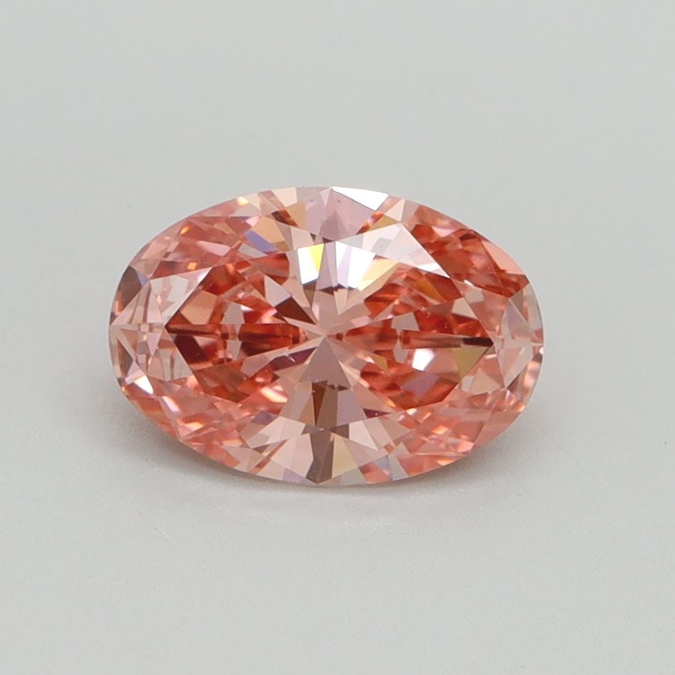 Loose Diamond - OVAL 1.08ct Fancy Vivid Pink VS2: Loose Diamond - OVAL 1.08ct Fancy Vivid Pink VS2 Source: This is a real non-mined Diamond that has been grown in a lab Shape: OVAL Carats: 1.08 Color: Fancy Vivid Pink Certification: IGI Video: