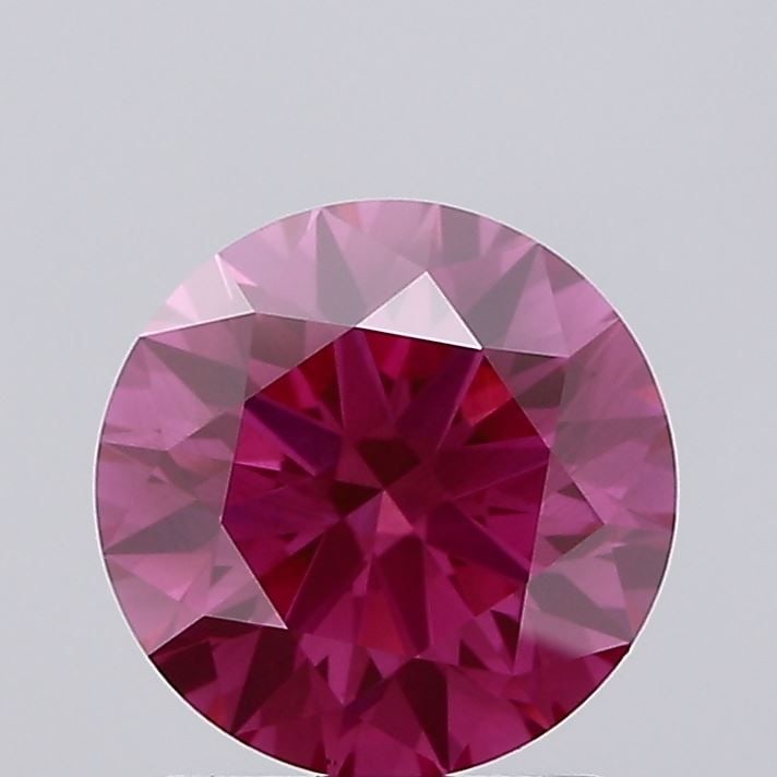 Ideal Loose Diamond - ROUND 1.57ct Fancy Vivid Pink VS2: Ideal Loose Diamond - ROUND 1.57ct Fancy Vivid Pink VS2 Source: This is a real non-mined Diamond that has been grown in a lab Shape: ROUND Carats: 1.57 Color: Fancy Vivid Pink Certification: IGI Video
