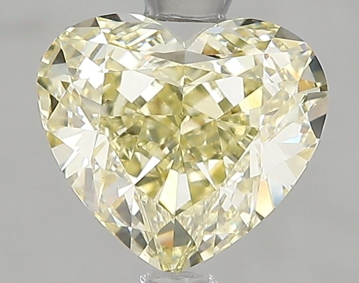 Loose Diamond - HEART 2.01ct Fancy Yellow VS1: Loose Diamond - HEART 2.01ct Fancy Yellow VS1 Source: This is a real non-mined Diamond that has been grown in a lab Shape: HEART Carats: 2.01 Color: Fancy Yellow Certification: IGI Video: