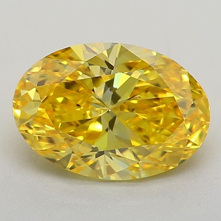 Loose Diamond - OVAL 0.84ct Fancy Vivid Yellow VVS2: Loose Diamond - OVAL 0.84ct Fancy Vivid Yellow VVS2 Source: This is a real non-mined Diamond that has been grown in a lab Shape: OVAL Carats: 0.84 Color: Fancy Vivid Yellow Certification: IGI Video: