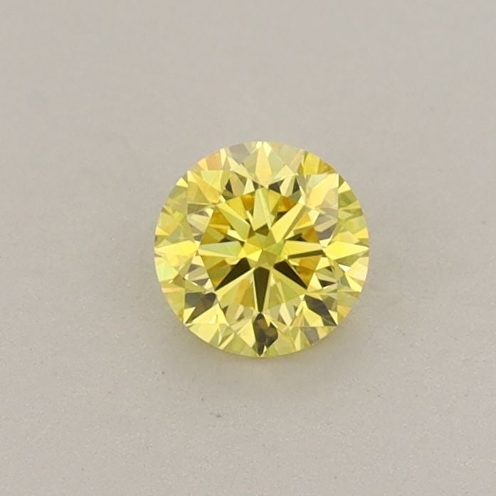 Loose Diamond - ROUND 0.3ct Fancy Vivid Yellow VS1: Loose Diamond - ROUND 0.3ct Fancy Vivid Yellow VS1 Source: This is a real non-mined Diamond that has been grown in a lab Shape: ROUND Carats: 0.3 Color: Fancy Vivid Yellow Certification: IGI Video: