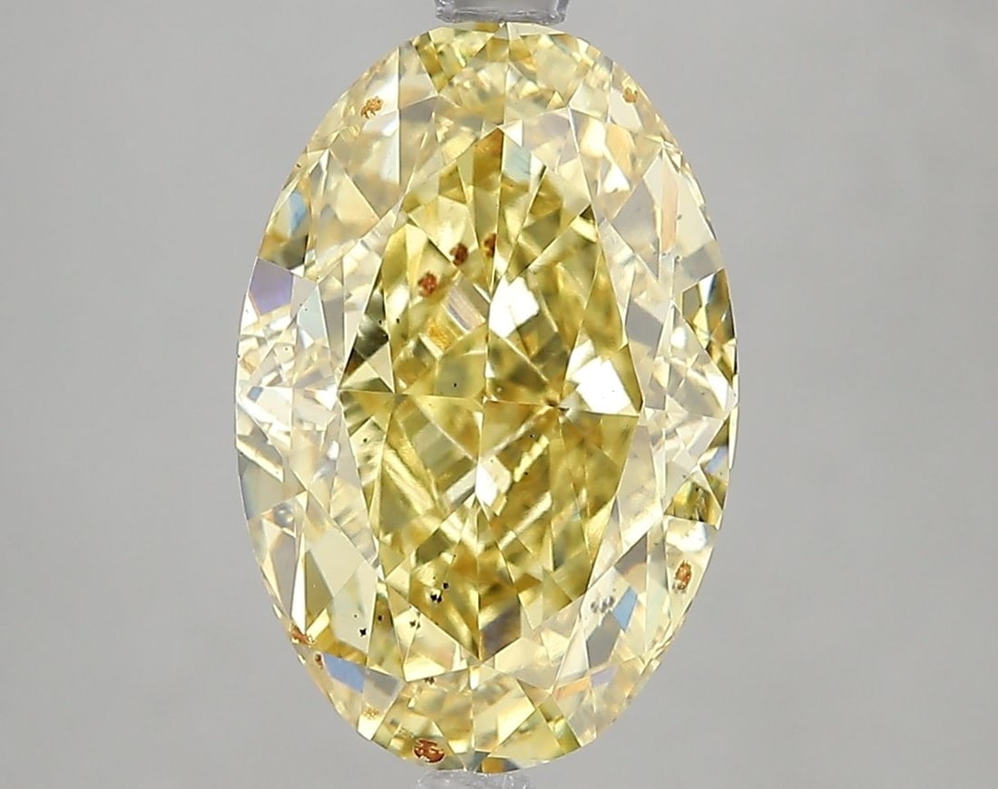 Loose Diamond - OVAL 5.01ct Fancy Intense Yellow SI1: Loose Diamond - OVAL 5.01ct Fancy Intense Yellow SI1 Source: This is a real non-mined Diamond that has been grown in a lab Shape: OVAL Carats: 5.01 Color: Fancy Intense Yellow Certification: IGI Video