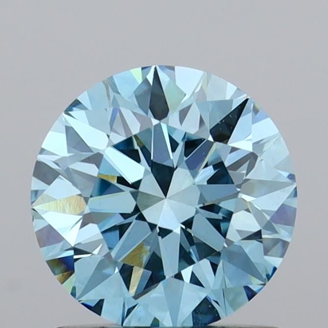 Ideal Loose Diamond - ROUND 1.02ct Fancy Vivid Blue VS1: Ideal Loose Diamond - ROUND 1.02ct Fancy Vivid Blue VS1 Source: This is a real non-mined Diamond that has been grown in a lab Shape: ROUND Carats: 1.02 Color: Fancy Vivid Blue Certification: IGI Video