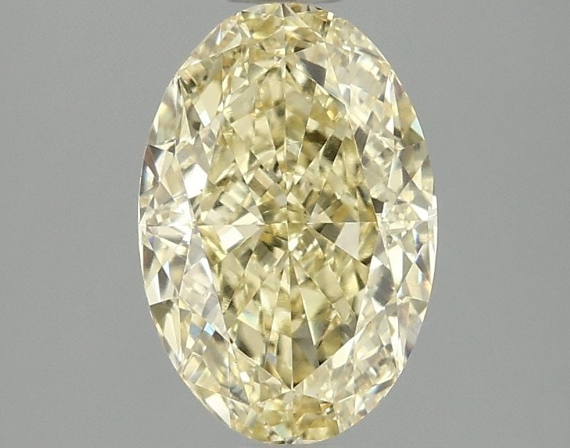 Loose Diamond - OVAL 2.09ct Fancy Vivid Yellow VVS2: Loose Diamond - OVAL 2.09ct Fancy Vivid Yellow VVS2 Source: This is a real non-mined Diamond that has been grown in a lab Shape: OVAL Carats: 2.09 Color: Fancy Vivid Yellow Certification: IGI Video:
