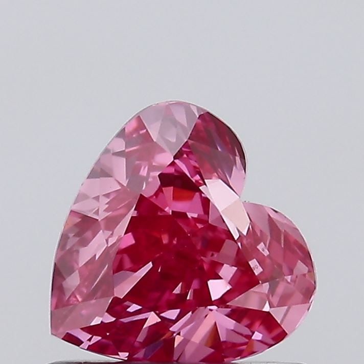 Loose Diamond - HEART 0.74ct Fancy Vivid Pink VS1: Loose Diamond - HEART 0.74ct Fancy Vivid Pink VS1 Source: This is a real non-mined Diamond that has been grown in a lab Shape: HEART Carats: 0.74 Color: Fancy Vivid Pink Certification: IGI Video: