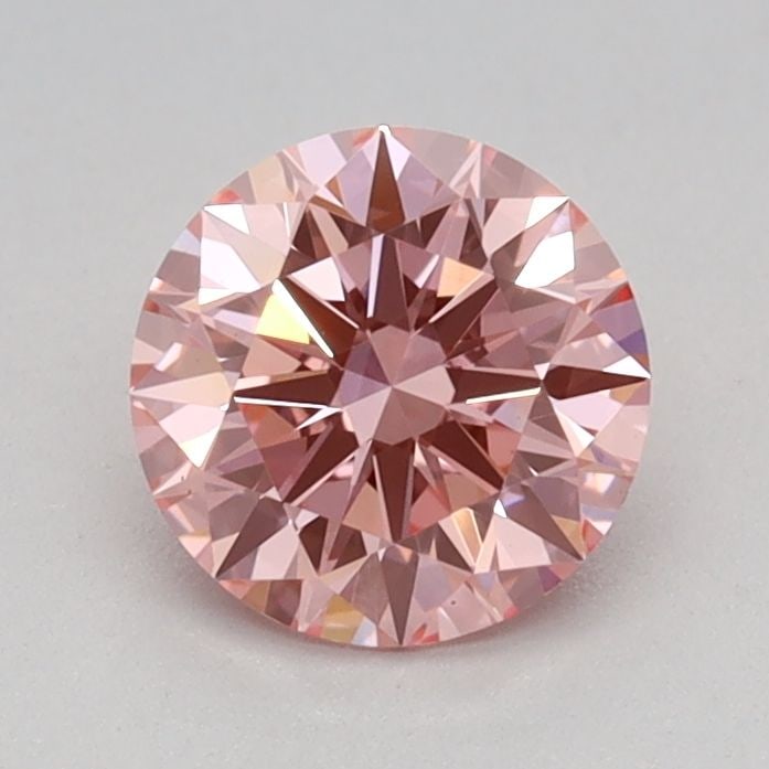 Ideal Loose Diamond - ROUND 0.64ct Fancy Vivid Pink VS1: Ideal Loose Diamond - ROUND 0.64ct Fancy Vivid Pink VS1 Source: This is a real non-mined Diamond that has been grown in a lab Shape: ROUND Carats: 0.64 Color: Fancy Vivid Pink Certification: IGI Video