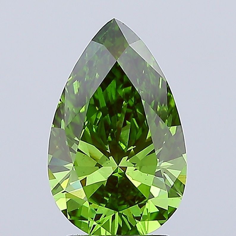 Loose Diamond - PEAR 3.01ct Fancy Vivid Green VS2: Loose Diamond - PEAR 3.01ct Fancy Vivid Green VS2 Source: This is a real non-mined Diamond that has been grown in a lab Shape: PEAR Carats: 3.01 Color: Fancy Vivid Green Certification: IGI Video: