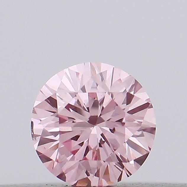 Loose Diamond - ROUND 0.12ct Fancy Vivid Pink VS2: Loose Diamond - ROUND 0.12ct Fancy Vivid Pink VS2 Source: This is a real non-mined Diamond that has been grown in a lab Shape: ROUND Carats: 0.12 Color: Fancy Vivid Pink Certification: IGI Video: