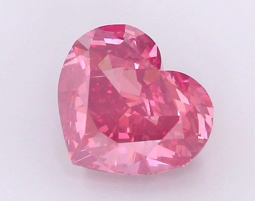 Loose Diamond - HEART 5.13ct Fancy Vivid Pink VS1: Loose Diamond - HEART 5.13ct Fancy Vivid Pink VS1 Source: This is a real non-mined Diamond that has been grown in a lab Shape: HEART Carats: 5.13 Color: Fancy Vivid Pink Certification: IGI Video: