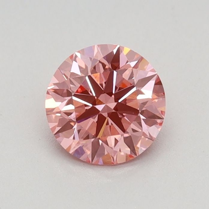 Ideal Loose Diamond - ROUND 0.51ct Fancy Vivid Pink VS1: Ideal Loose Diamond - ROUND 0.51ct Fancy Vivid Pink VS1 Source: This is a real non-mined Diamond that has been grown in a lab Shape: ROUND Carats: 0.51 Color: Fancy Vivid Pink Certification: IGI Video