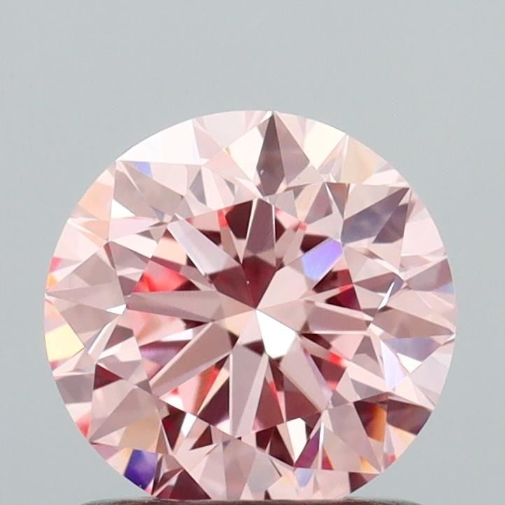 Ideal Loose Diamond - ROUND 1.01ct Fancy Vivid Pink VS1: Ideal Loose Diamond - ROUND 1.01ct Fancy Vivid Pink VS1 Source: This is a real non-mined Diamond that has been grown in a lab Shape: ROUND Carats: 1.01 Color: Fancy Vivid Pink Certification: IGI Video