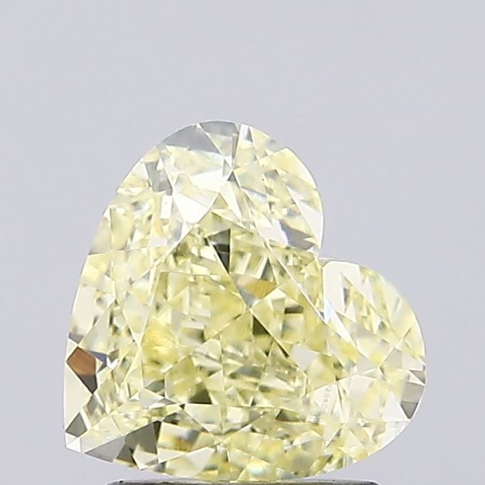 Loose Diamond - HEART 2.1ct Fancy Yellow VVS2: Loose Diamond - HEART 2.1ct Fancy Yellow VVS2 Source: This is a real non-mined Diamond that has been grown in a lab Shape: HEART Carats: 2.1 Color: Fancy Yellow Certification: IGI Video: Video Link 