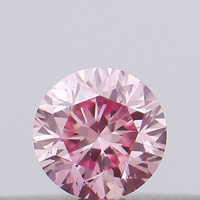 Loose Diamond - ROUND 0.1ct Fancy Vivid Pink VS1: Loose Diamond - ROUND 0.1ct Fancy Vivid Pink VS1 Source: This is a real non-mined Diamond that has been grown in a lab Shape: ROUND Carats: 0.1 Color: Fancy Vivid Pink Certification: IGI Video: