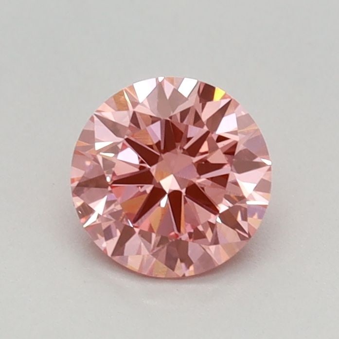 Ideal Loose Diamond - ROUND 0.45ct Fancy Vivid Pink VS1: Ideal Loose Diamond - ROUND 0.45ct Fancy Vivid Pink VS1 Source: This is a real non-mined Diamond that has been grown in a lab Shape: ROUND Carats: 0.45 Color: Fancy Vivid Pink Certification: IGI Video