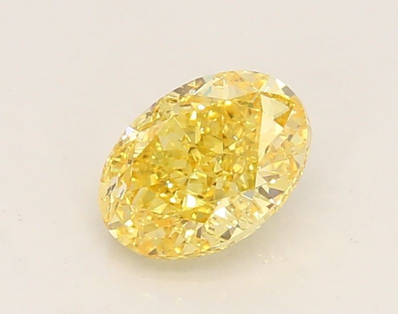 Loose Diamond - OVAL 1.09ct Fancy Vivid Yellow SI2: Loose Diamond - OVAL 1.09ct Fancy Vivid Yellow SI2 Source: This is a real non-mined Diamond that has been grown in a lab Shape: OVAL Carats: 1.09 Color: Fancy Vivid Yellow Certification: IGI Video: