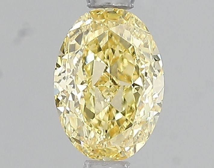 Loose Diamond - OVAL 1.03ct Fancy Intense Yellow VS2: Loose Diamond - OVAL 1.03ct Fancy Intense Yellow VS2 Source: This is a real non-mined Diamond that has been grown in a lab Shape: OVAL Carats: 1.03 Color: Fancy Intense Yellow Certification: IGI Video