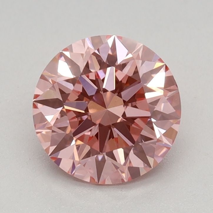 Ideal Loose Diamond - ROUND 0.82ct Fancy Vivid Pink VVS2: Ideal Loose Diamond - ROUND 0.82ct Fancy Vivid Pink VVS2 Source: This is a real non-mined Diamond that has been grown in a lab Shape: ROUND Carats: 0.82 Color: Fancy Vivid Pink Certification: IGI Vide