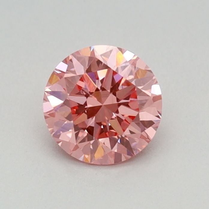 Loose Diamond - ROUND 0.48ct Fancy Vivid Pink VS1: Loose Diamond - ROUND 0.48ct Fancy Vivid Pink VS1 Source: This is a real non-mined Diamond that has been grown in a lab Shape: ROUND Carats: 0.48 Color: Fancy Vivid Pink Certification: IGI Video: