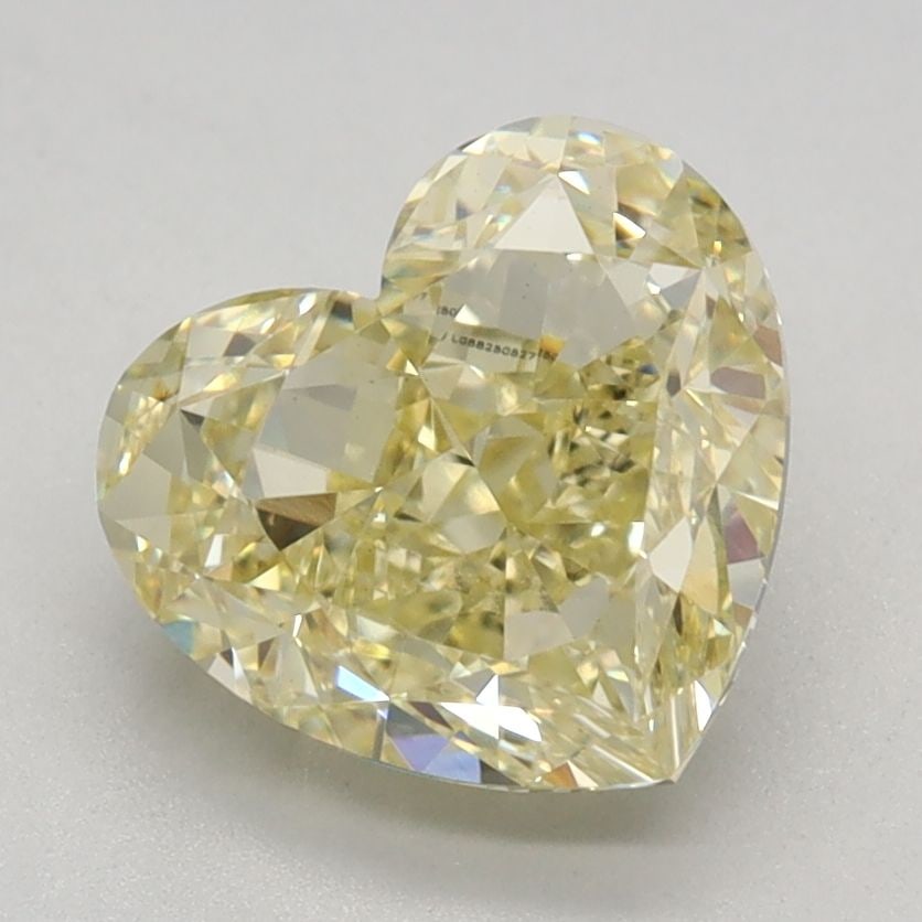 Loose Diamond - HEART 2.05ct Fancy Yellow VS1: Loose Diamond - HEART 2.05ct Fancy Yellow VS1 Source: This is a real non-mined Diamond that has been grown in a lab Shape: HEART Carats: 2.05 Color: Fancy Yellow Certification: IGI Video: