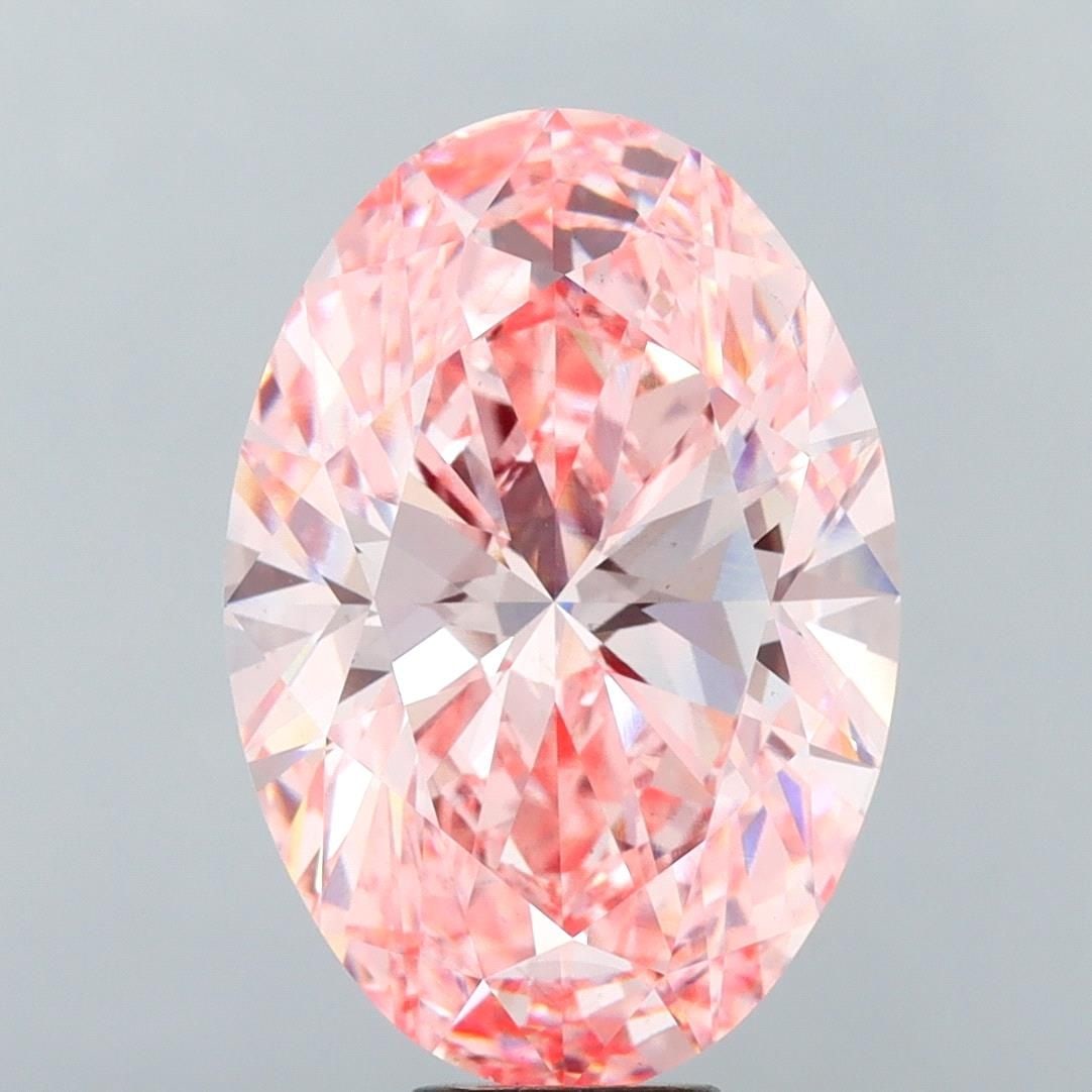 Loose Diamond - OVAL 15.09ct Fancy Vivid Pink VS1: Loose Diamond - OVAL 15.09ct Fancy Vivid Pink VS1 Source: This is a real non-mined Diamond that has been grown in a lab Shape: OVAL Carats: 15.09 Color: Fancy Vivid Pink Certification: IGI Video:
