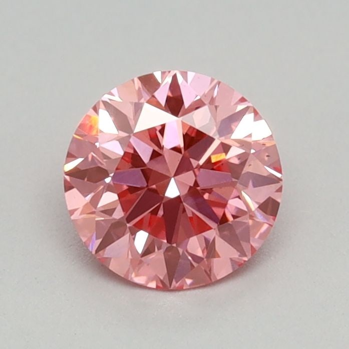 Ideal Loose Diamond - ROUND 0.39ct Fancy Vivid Pink VS2: Ideal Loose Diamond - ROUND 0.39ct Fancy Vivid Pink VS2 Source: This is a real non-mined Diamond that has been grown in a lab Shape: ROUND Carats: 0.39 Color: Fancy Vivid Pink Certification: IGI Video
