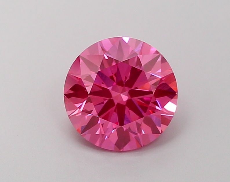 Ideal Loose Diamond - ROUND 1.8ct Fancy Vivid Pink VS2: Ideal Loose Diamond - ROUND 1.8ct Fancy Vivid Pink VS2 Source: This is a real non-mined Diamond that has been grown in a lab Shape: ROUND Carats: 1.8 Color: Fancy Vivid Pink Certification: IGI Video: