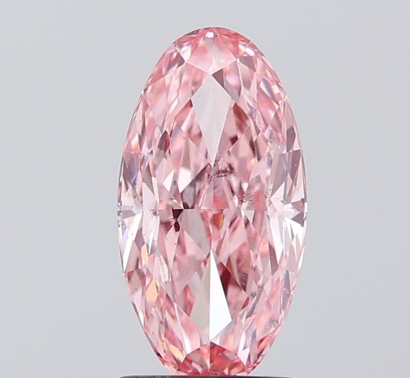 Loose Diamond - OVAL 2.11ct Fancy Vivid Pink VS2: Loose Diamond - OVAL 2.11ct Fancy Vivid Pink VS2 Source: This is a real non-mined Diamond that has been grown in a lab Shape: OVAL Carats: 2.11 Color: Fancy Vivid Pink Certification: IGI Video:
