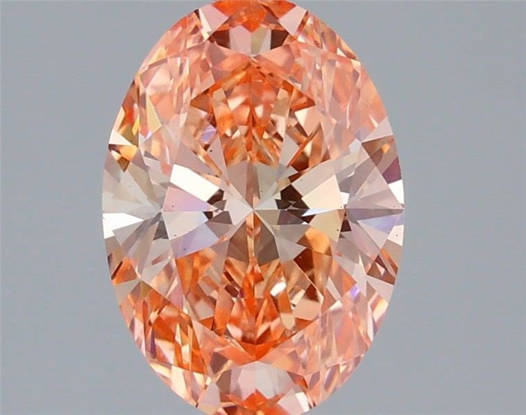 Loose Diamond - OVAL 2.1ct Fancy Vivid Orangey Pink VS2: Loose Diamond - OVAL 2.1ct Fancy Vivid Orangey Pink VS2 Source: This is a real non-mined Diamond that has been grown in a lab Shape: OVAL Carats: 2.1 Color: Fancy Vivid Orangey Pink Certification: IGI