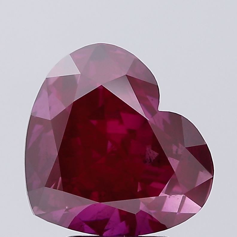 Loose Diamond - HEART 5.04ct Fancy Deep Pink SI1: Loose Diamond - HEART 5.04ct Fancy Deep Pink SI1 Source: This is a real non-mined Diamond that has been grown in a lab Shape: HEART Carats: 5.04 Color: Fancy Deep Pink Certification: IGI Video: