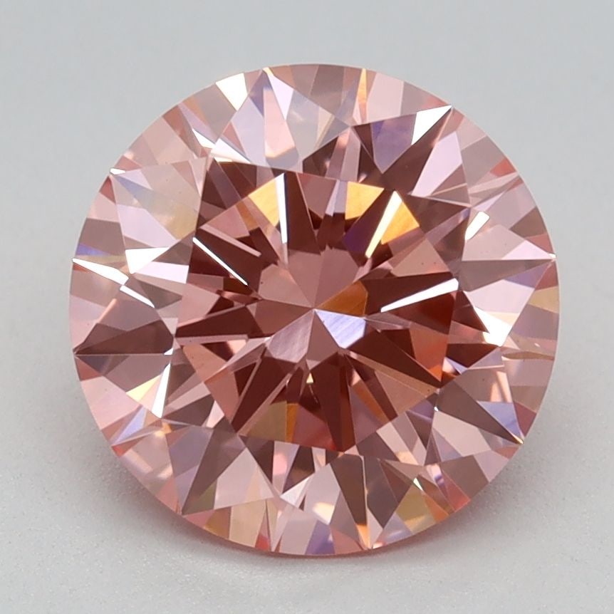 Ideal Loose Diamond - ROUND 2.08ct Fancy Vivid Pink VS1: Ideal Loose Diamond - ROUND 2.08ct Fancy Vivid Pink VS1 Source: This is a real non-mined Diamond that has been grown in a lab Shape: ROUND Carats: 2.08 Color: Fancy Vivid Pink Certification: IGI Video