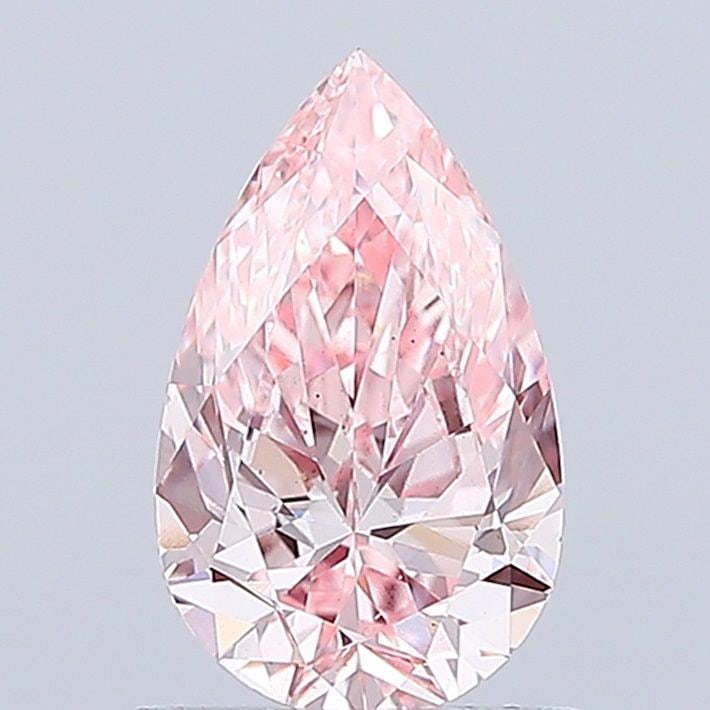 Loose Diamond - PEAR 1.0ct Fancy Vivid Pink VS2: Loose Diamond - PEAR 1.0ct Fancy Vivid Pink VS2 Source: This is a real non-mined Diamond that has been grown in a lab Shape: PEAR Carats: 1.0 Color: Fancy Vivid Pink Certification: IGI Video: