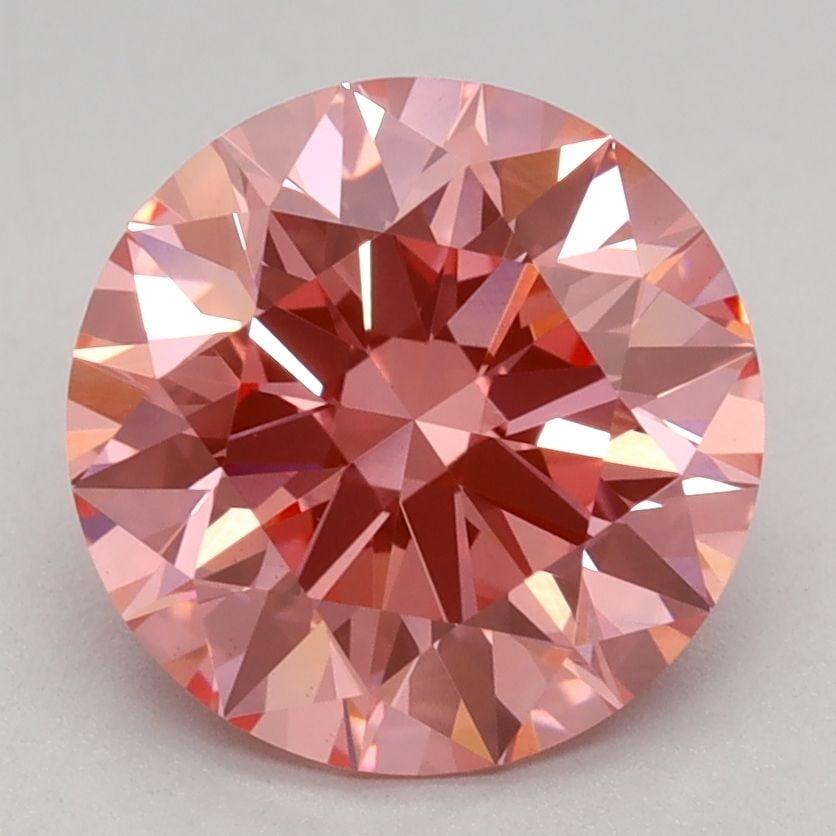 Ideal Loose Diamond - ROUND 2.1ct Fancy Vivid Pink VS1: Ideal Loose Diamond - ROUND 2.1ct Fancy Vivid Pink VS1 Source: This is a real non-mined Diamond that has been grown in a lab Shape: ROUND Carats: 2.1 Color: Fancy Vivid Pink Certification: IGI Video:
