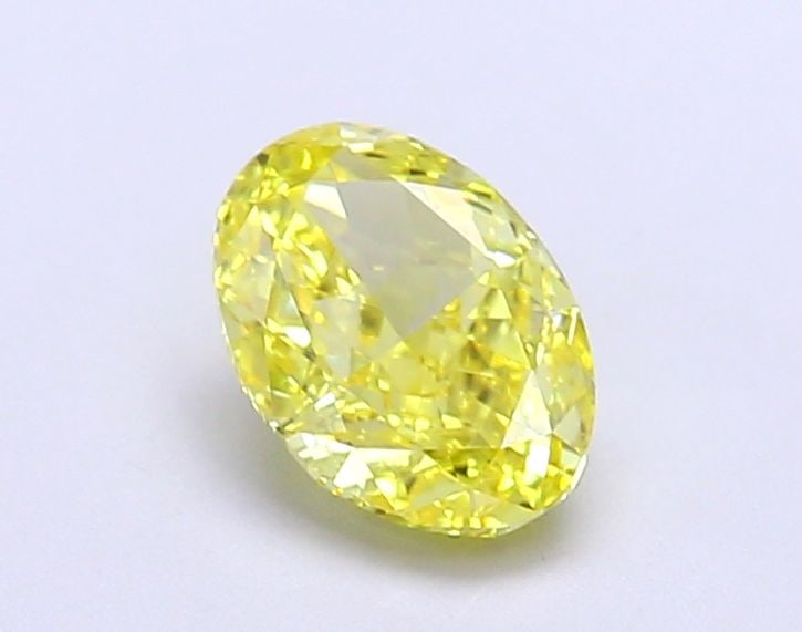 Loose Diamond - OVAL 1.03ct Fancy Vivid Yellow VVS2: Loose Diamond - OVAL 1.03ct Fancy Vivid Yellow VVS2 Source: This is a real non-mined Diamond that has been grown in a lab Shape: OVAL Carats: 1.03 Color: Fancy Vivid Yellow Certification: IGI Video: