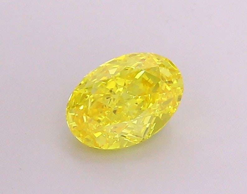 Loose Diamond - OVAL 1.49ct Fancy Vivid Yellow VS1: Loose Diamond - OVAL 1.49ct Fancy Vivid Yellow VS1 Source: This is a real non-mined Diamond that has been grown in a lab Shape: OVAL Carats: 1.49 Color: Fancy Vivid Yellow Certification: IGI Video:
