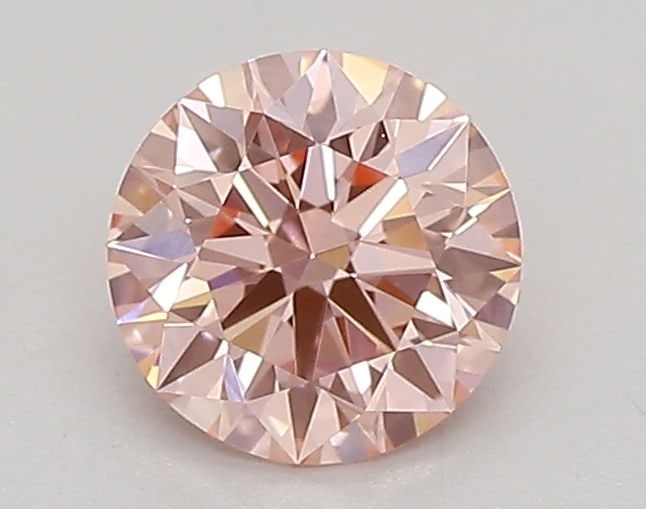 Ideal Loose Diamond - ROUND 0.54ct Fancy Vivid Pink VVS1: Ideal Loose Diamond - ROUND 0.54ct Fancy Vivid Pink VVS1 Source: This is a real non-mined Diamond that has been grown in a lab Shape: ROUND Carats: 0.54 Color: Fancy Vivid Pink Certification: IGI Vide