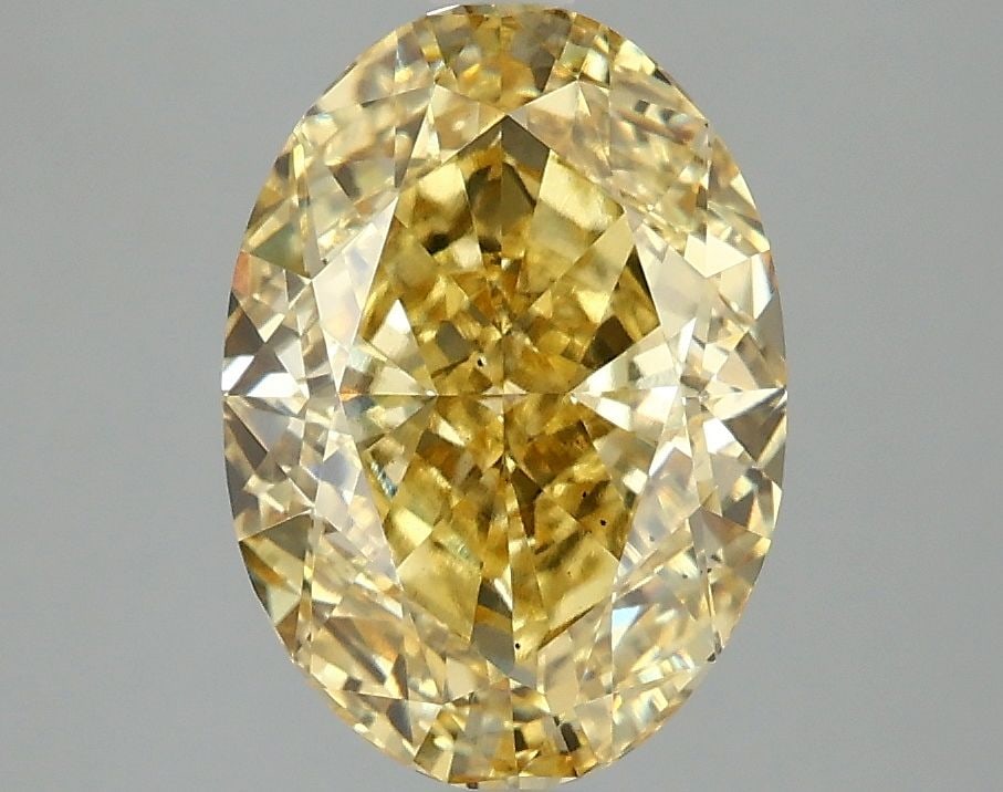 Loose Diamond - OVAL 3.09ct Fancy Vivid Yellow VS2: Loose Diamond - OVAL 3.09ct Fancy Vivid Yellow VS2 Source: This is a real non-mined Diamond that has been grown in a lab Shape: OVAL Carats: 3.09 Color: Fancy Vivid Yellow Certification: IGI Video: