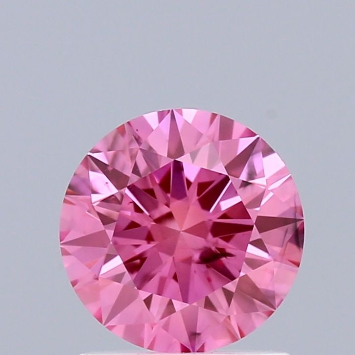 Loose Diamond - ROUND 0.91ct Fancy Vivid Pink SI1: Loose Diamond - ROUND 0.91ct Fancy Vivid Pink SI1 Source: This is a real non-mined Diamond that has been grown in a lab Shape: ROUND Carats: 0.91 Color: Fancy Vivid Pink Certification: IGI Video: