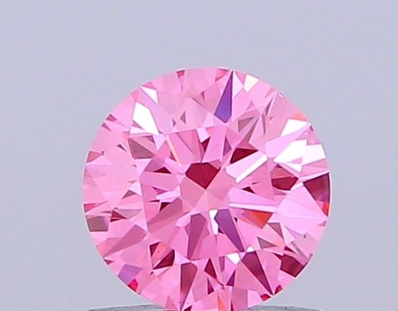 Ideal Loose Diamond - ROUND 0.66ct Fancy Vivid Pink VS2: Ideal Loose Diamond - ROUND 0.66ct Fancy Vivid Pink VS2 Source: This is a real non-mined Diamond that has been grown in a lab Shape: ROUND Carats: 0.66 Color: Fancy Vivid Pink Certification: IGI Video