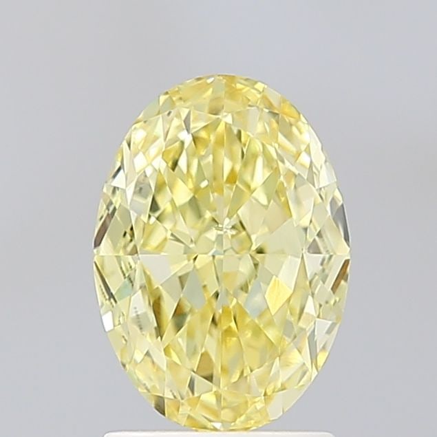 Loose Diamond - OVAL 2.06ct Fancy Vivid Yellow VS2: Loose Diamond - OVAL 2.06ct Fancy Vivid Yellow VS2 Source: This is a real non-mined Diamond that has been grown in a lab Shape: OVAL Carats: 2.06 Color: Fancy Vivid Yellow Certification: IGI Video: