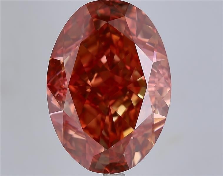 Loose Diamond - OVAL 15.08ct Fancy Vivid Orangey Pink VS1: Loose Diamond - OVAL 15.08ct Fancy Vivid Orangey Pink VS1 Source: This is a real non-mined Diamond that has been grown in a lab Shape: OVAL Carats: 15.08 Color: Fancy Vivid Orangey Pink Certification: