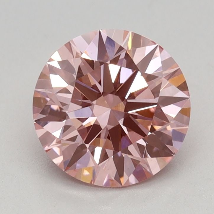 Ideal Loose Diamond - ROUND 0.93ct Fancy Vivid Pink VS1: Ideal Loose Diamond - ROUND 0.93ct Fancy Vivid Pink VS1 Source: This is a real non-mined Diamond that has been grown in a lab Shape: ROUND Carats: 0.93 Color: Fancy Vivid Pink Certification: IGI Video