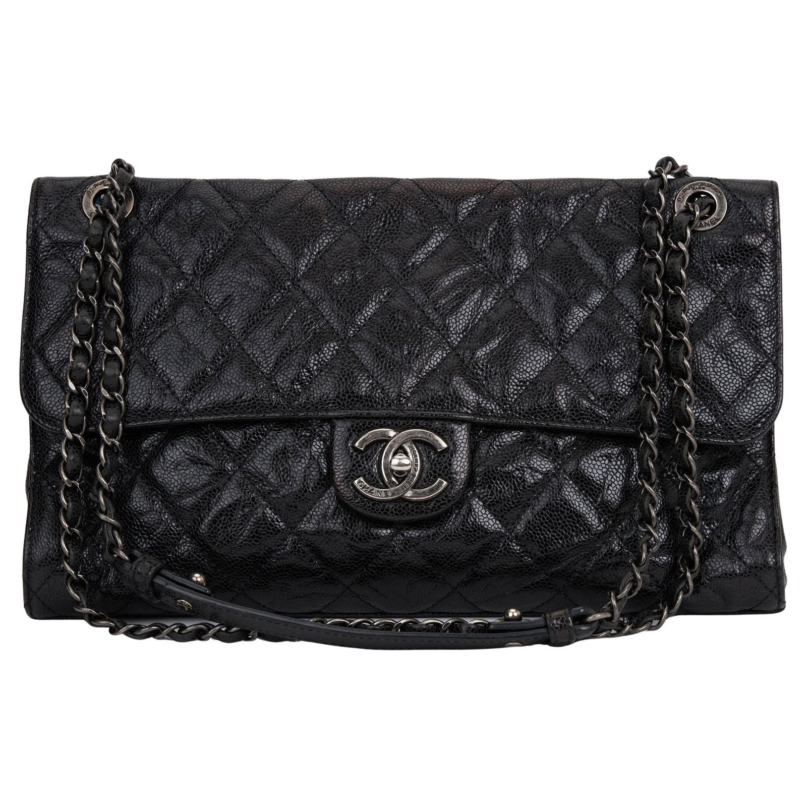 Chanel Paris-Edinburgh Crave Black Flap Bag with Ruthenium Hardware: Chanel Paris-Edinburgh Crave Black Flap Bag with Ruthenium Hardware Elevate your style with the Chanel Paris-Edinburgh Crave Black Glazed Flap Bag. Crafted in Italy, this exquisite bag features luxuri