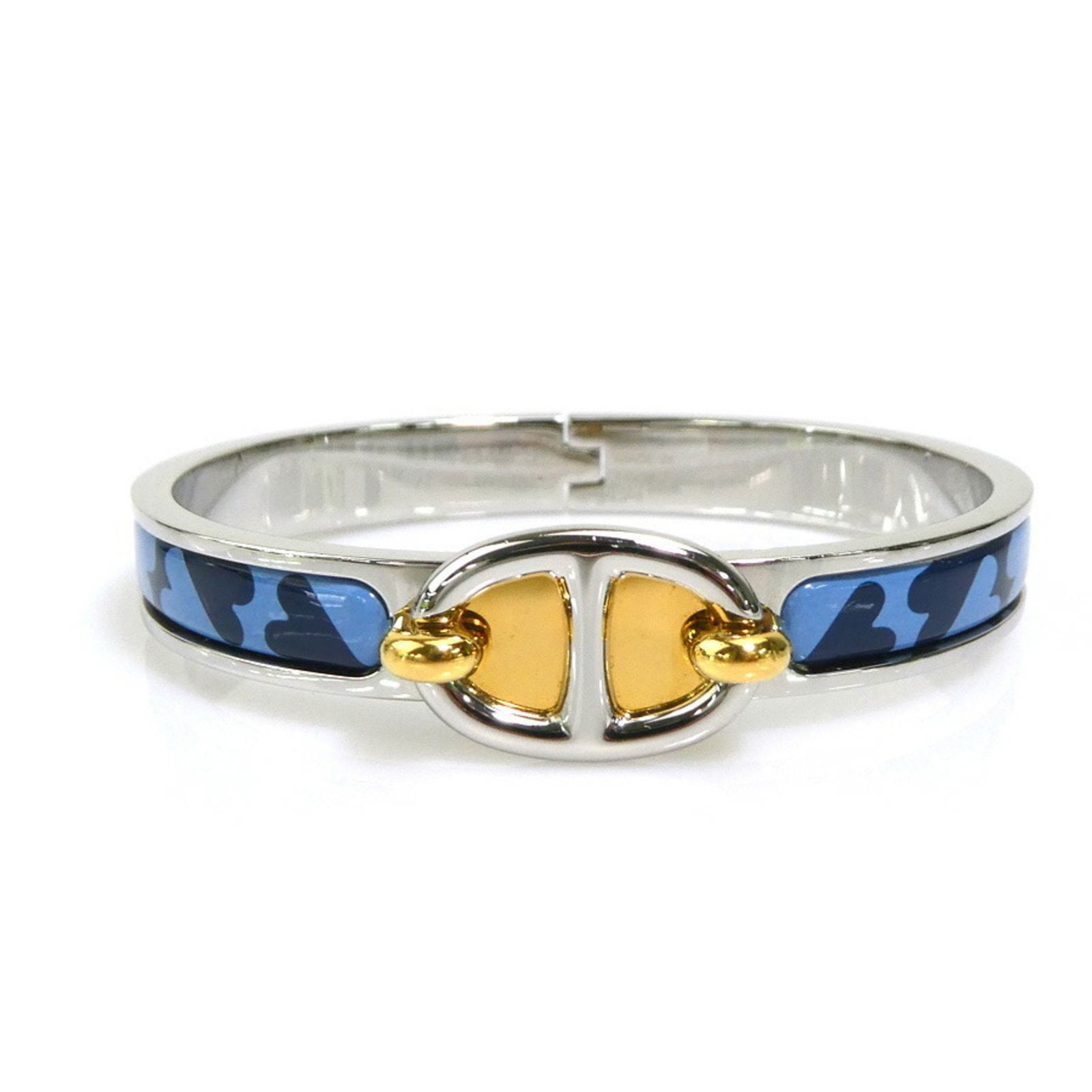 Blue Metal Clic Mini Bracelet by Hermes for Women: Blue Metal Clic Mini Bracelet by Hermes for Women The Hermes Clic Mini is a stylish bracelet crafted from metal in a blue color. Designed for women, it features a slim profile and is made in France. T