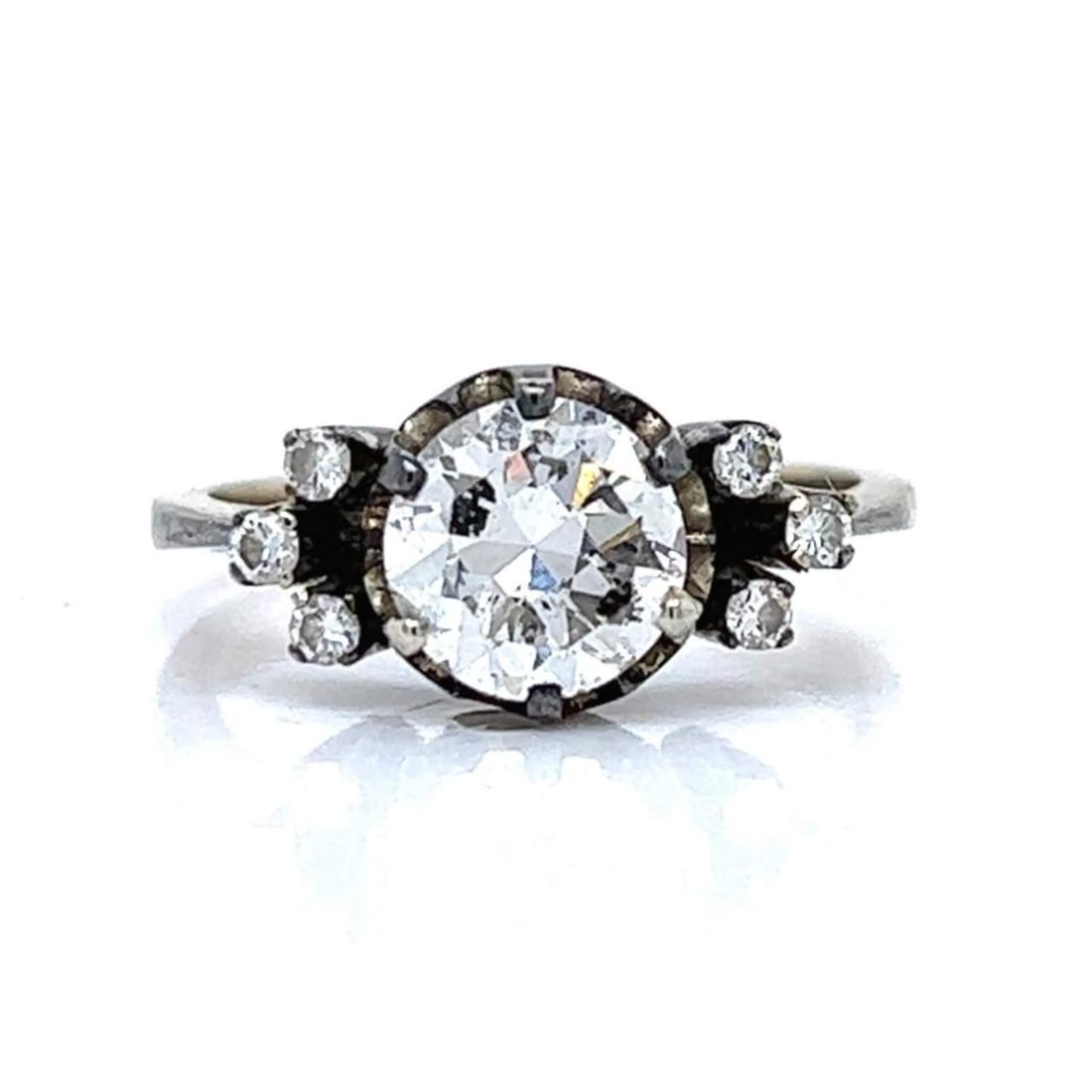 Art Deco 18K White Gold Diamond Ring 1.60 Ct Center Stone: Art Deco 18K White Gold Diamond Ring 1.60 Ct Center Stone This exquisite Art Deco ring is crafted from 18K white gold and features a stunning 1.60 ct European-cut diamond at its center, boasting I col