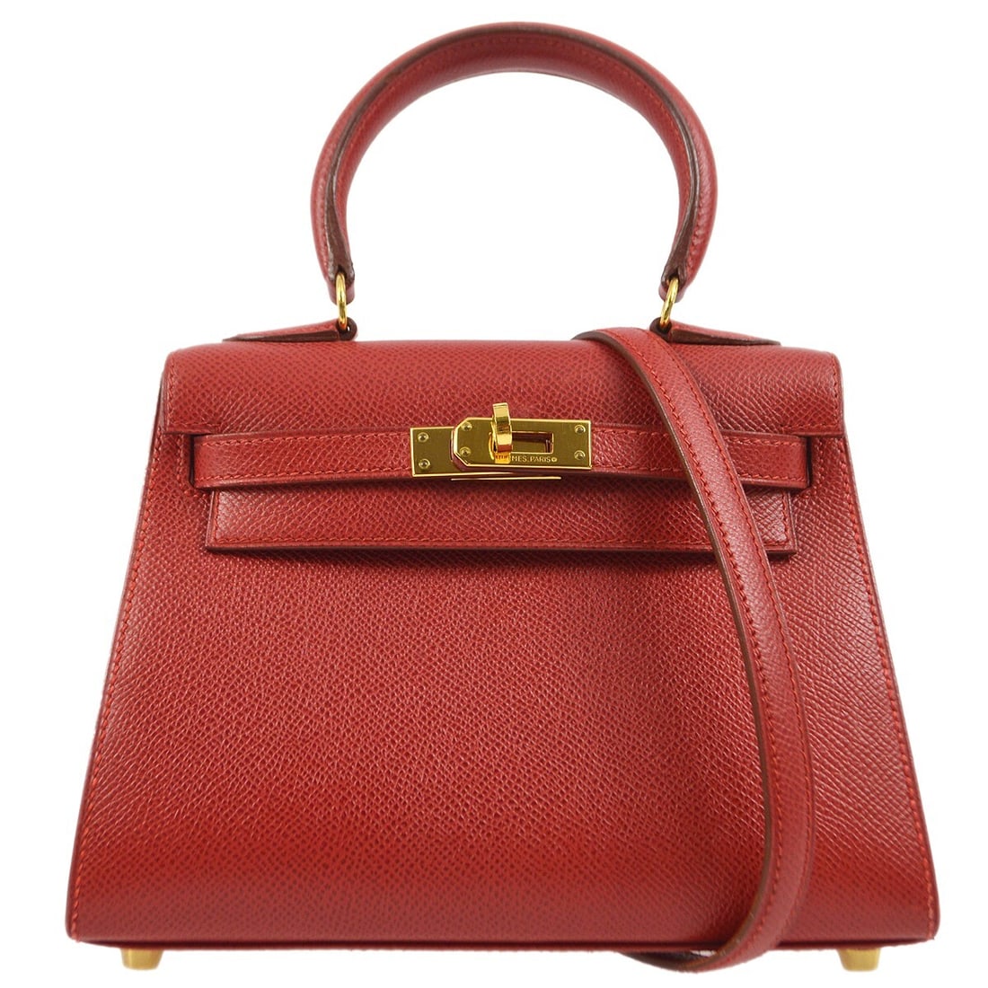 Mini Kelly 20 Rouge Vif Couchevel Leather Top Handle Handbag by Hermes: Mini Kelly 20 Rouge Vif Couchevel Leather Top Handle Handbag by Hermes This Hermes Mini Kelly 20 handbag features a striking Rouge Vif color in grained Couchevel leather with a coated finish. Designed