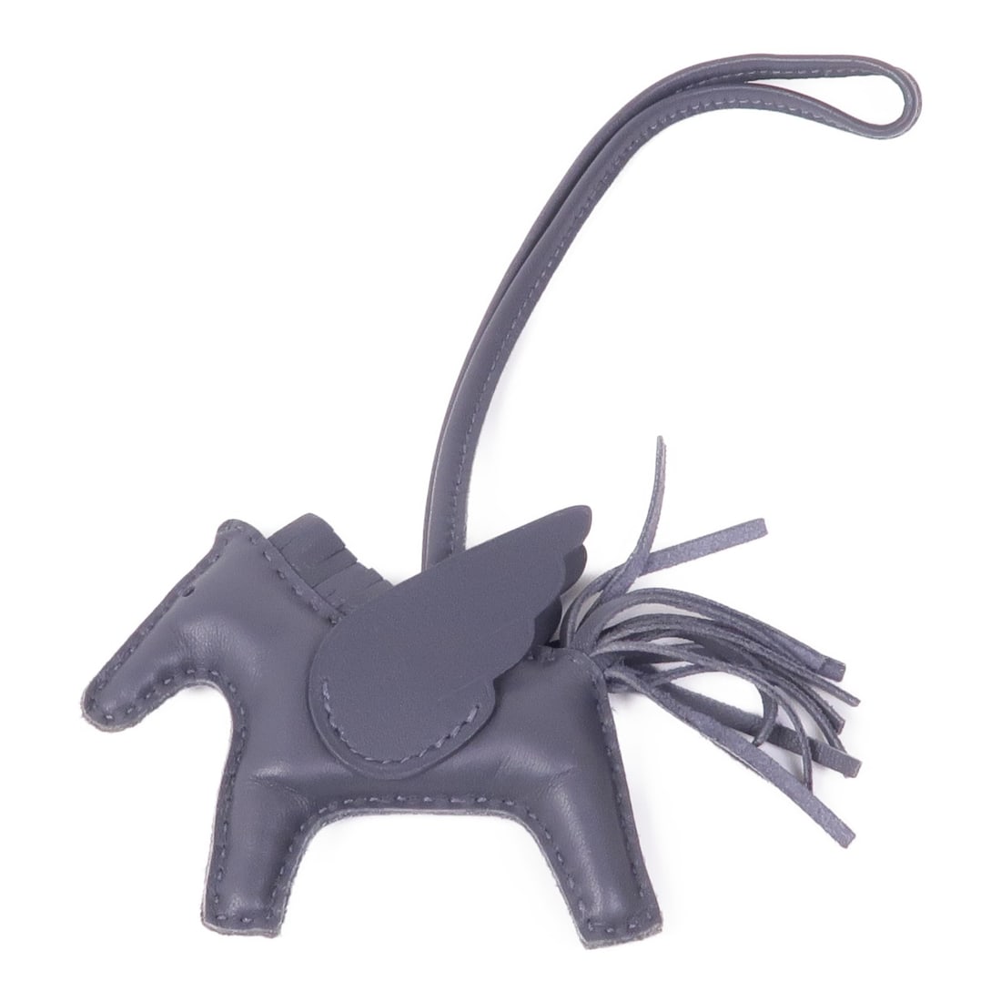 HERMES Rodeo Pegase PM Gray Lambskin Leather Charm: HERMES Rodeo Pegase PM Gray Lambskin Leather Charm Enhance your collection with this stylish HERMES Rodeo Pegase PM Charm, crafted from luxurious gray lambskin (sheep leather). This charming accessory